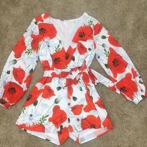Long-sleeved flower/ ladybug romper. Size: Large